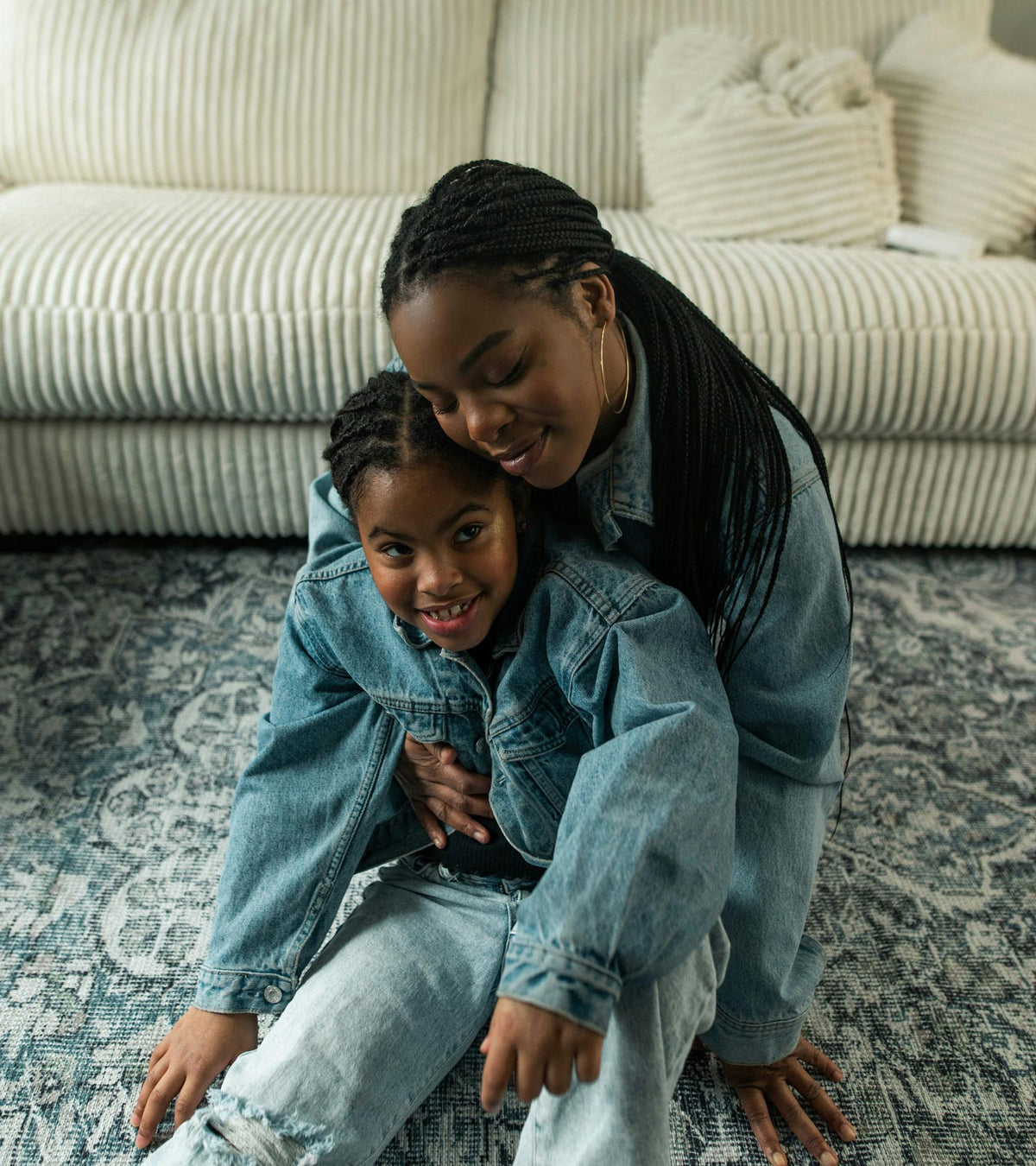 a black mom and daughter